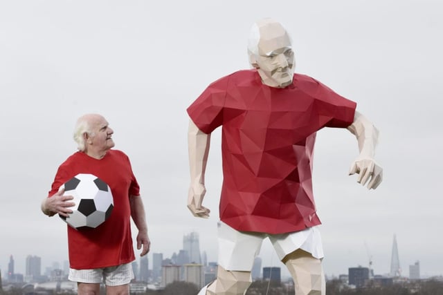 Dickie Borthwick Britains oldest footballer, with a paper sculpture.