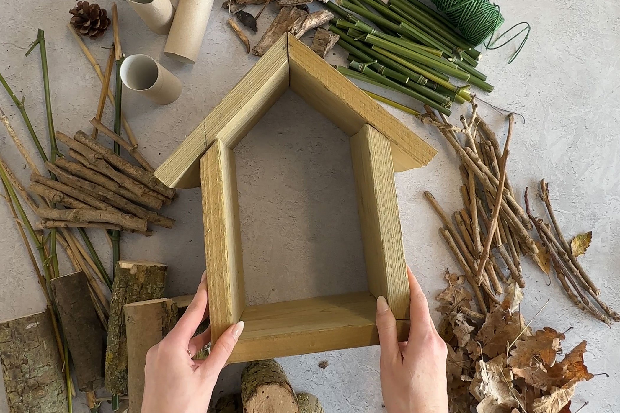 Step Two - ssemble your pieces of wood into a house shape